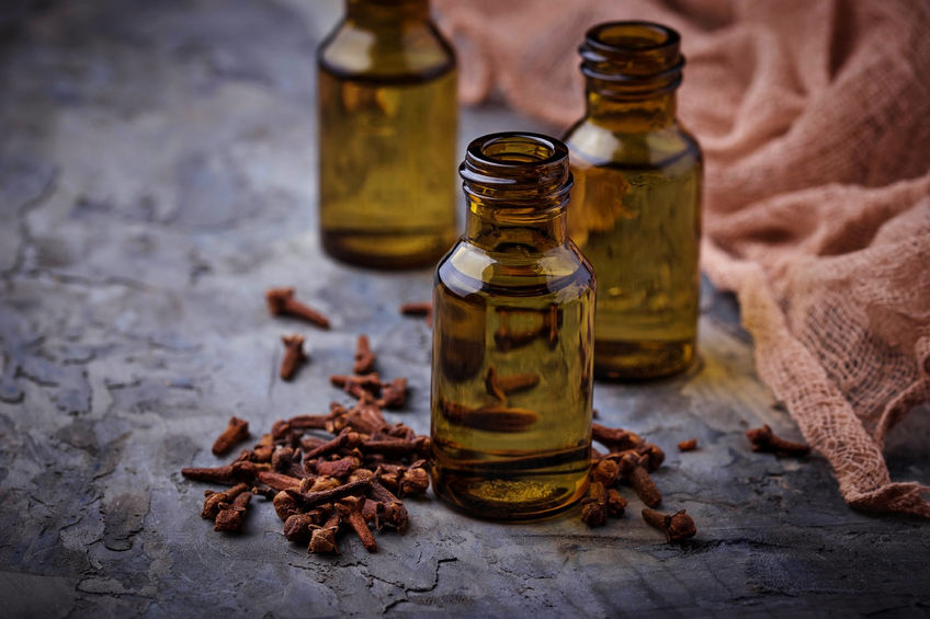 66020675 - oil of cloves in a small bottle. selective focus
